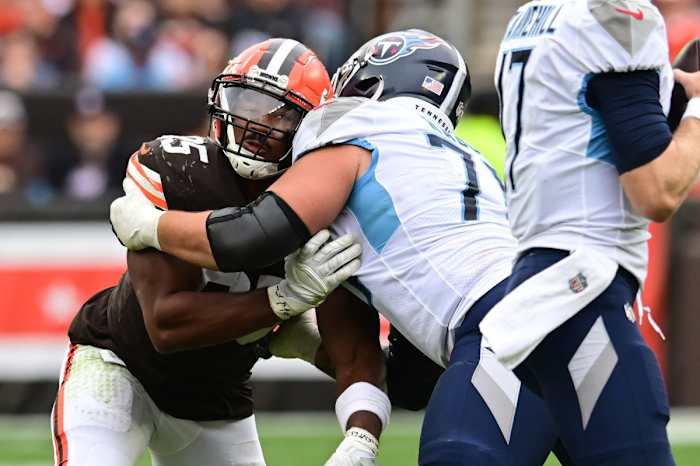 Cleveland Browns defensive end Myles Garrett (95) rushes against Tennessee Titans offensive tackle Dillon Radunz (75) as quarterback Ryan Tannehill (17) looks to pass during the second half at Cleveland Browns Stadium. (Ken Blaze-USA TODAY Sports)